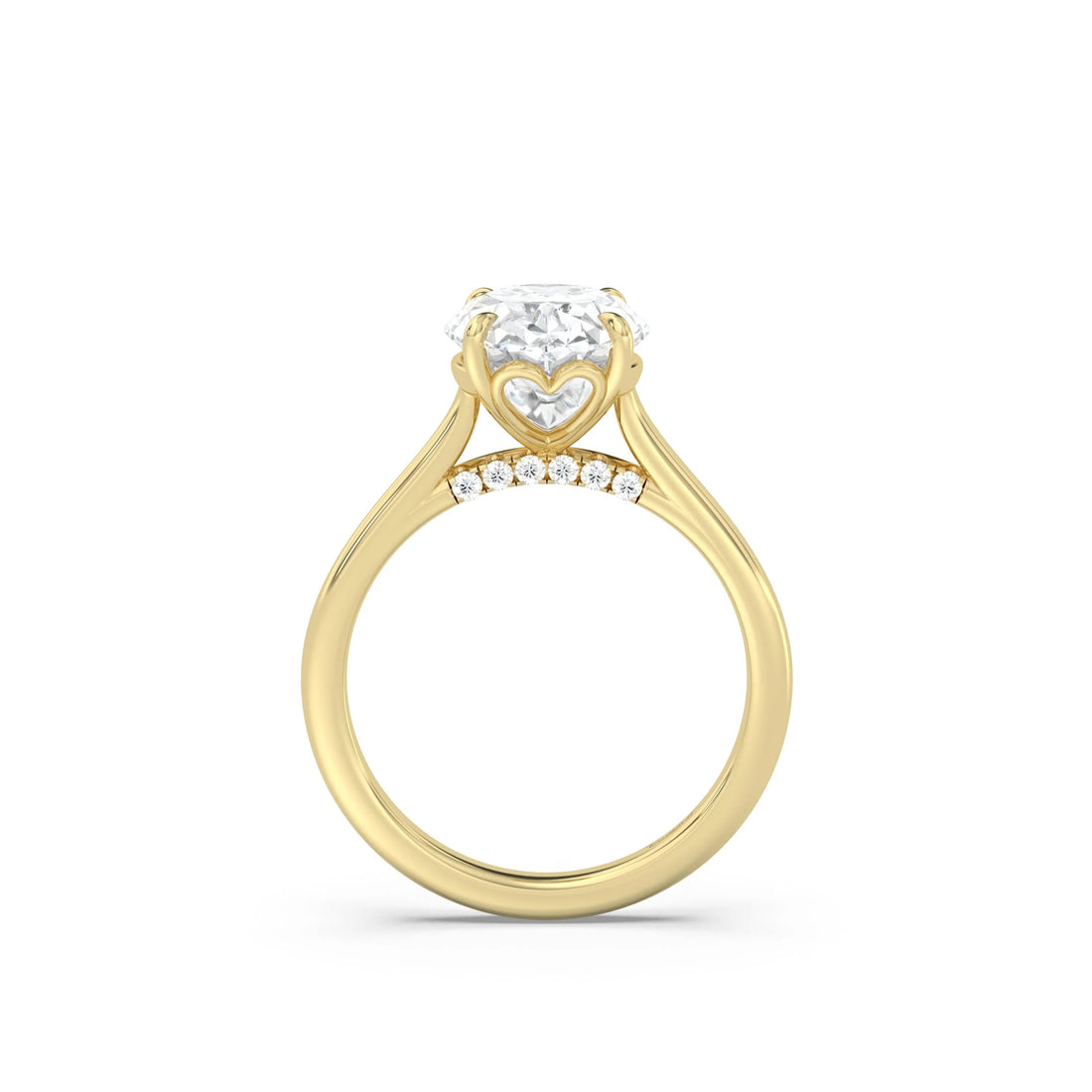 Yellow gold engagement ring with hidden hearts in the setting and a lab diamond pave bridge