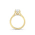 Yellow gold engagement ring with hidden hearts in the setting and a lab diamond pave bridge
