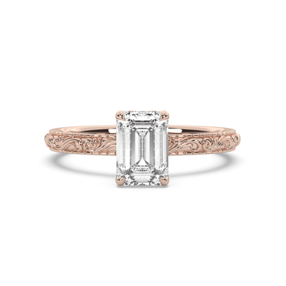 Rose gold engraved engagement ring with emerald diamond